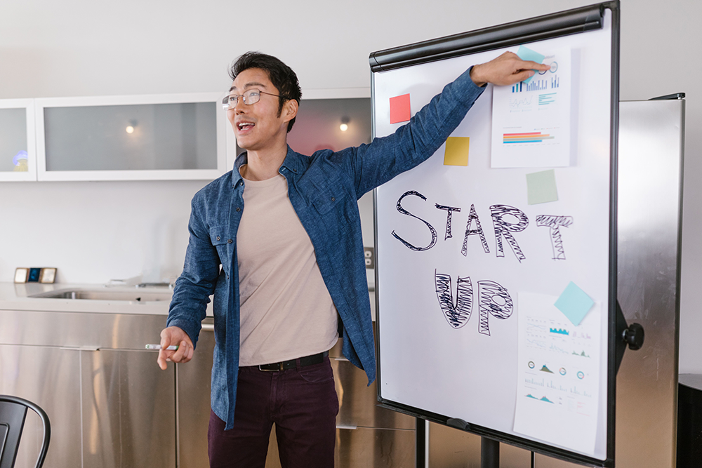 Entrepreneur at a whiteboard
